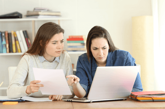 women reviewing content i.e performing translation review